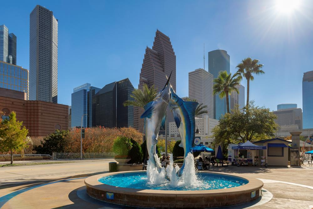 Downtown Aquarium fountain on a sunny day in Houston, Texas