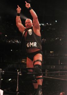 Steve Austin signature pose, flipping off the audience