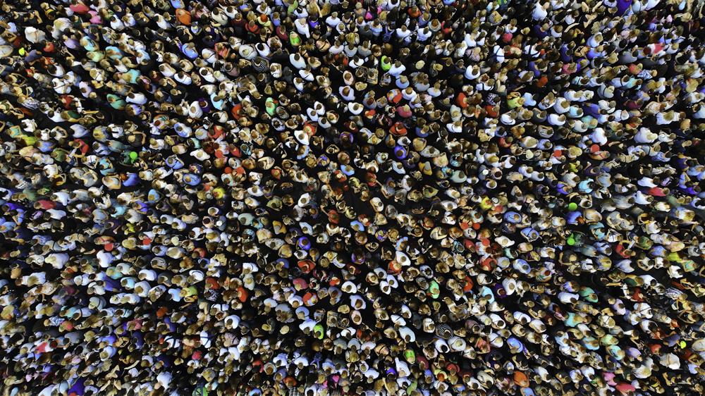 A crowd of people gathered together
