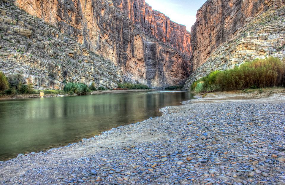 a small river and Santa Elena Canyon in the Big Bend