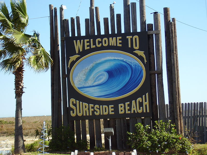 the entrance sign to Surfside Beach