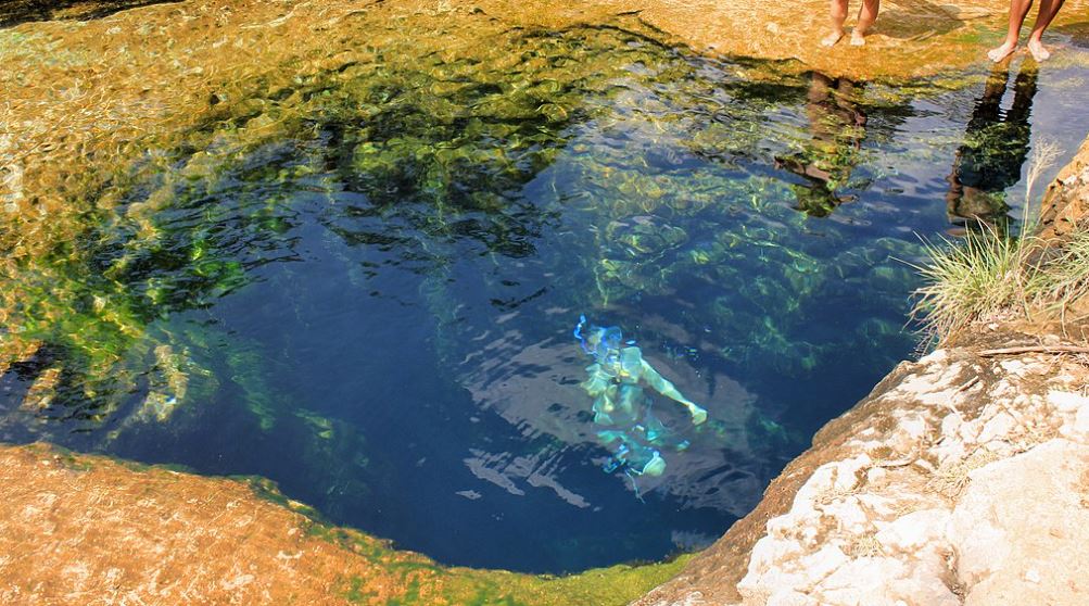a swimmer in Jacob's Well