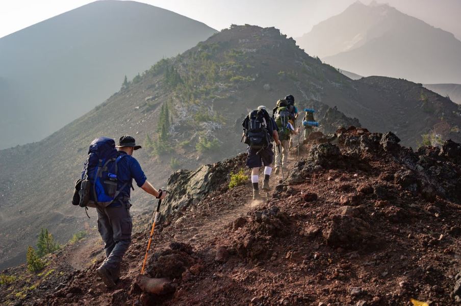 A group of person hiking in the mountain