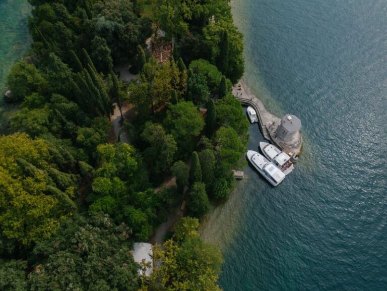 An aerial view of a tower and yachts