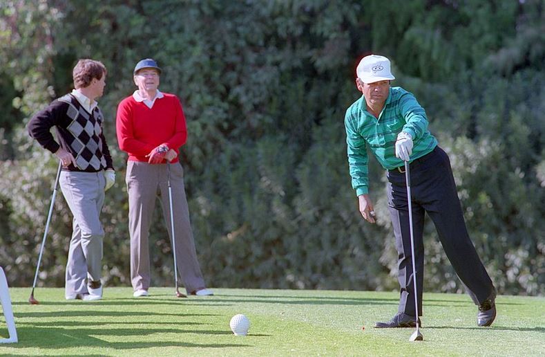 An image of Tom Watson, President Ronald Reagan, and Lee Trevino in 1988