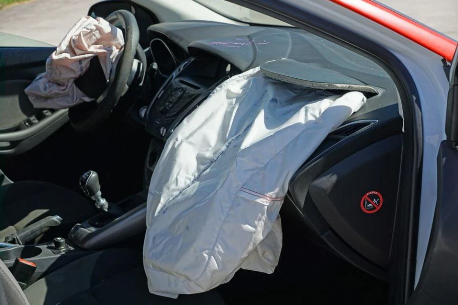 deployed air bags in a car after a collision