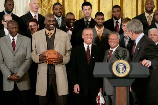 O'Neal holding the championship ball when the NBA Champion Heat visited the White House