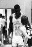 O'Neal playing for the Cole High School varsity basketball team in 1988–89