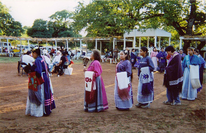 people in costume to dance the Caddo turkey dance