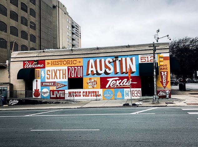 A wall painted with signs in Austin, Texas