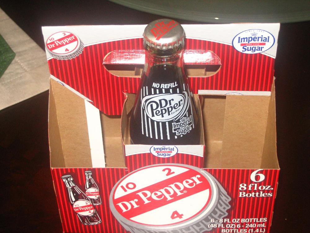 Old bottle and packaging of Dr Pepper