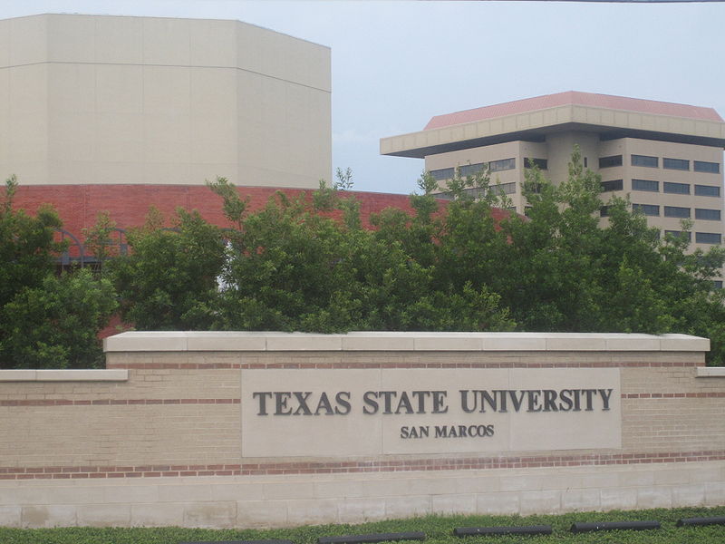 at the entrance of Texas State University in San Marcos, Texas