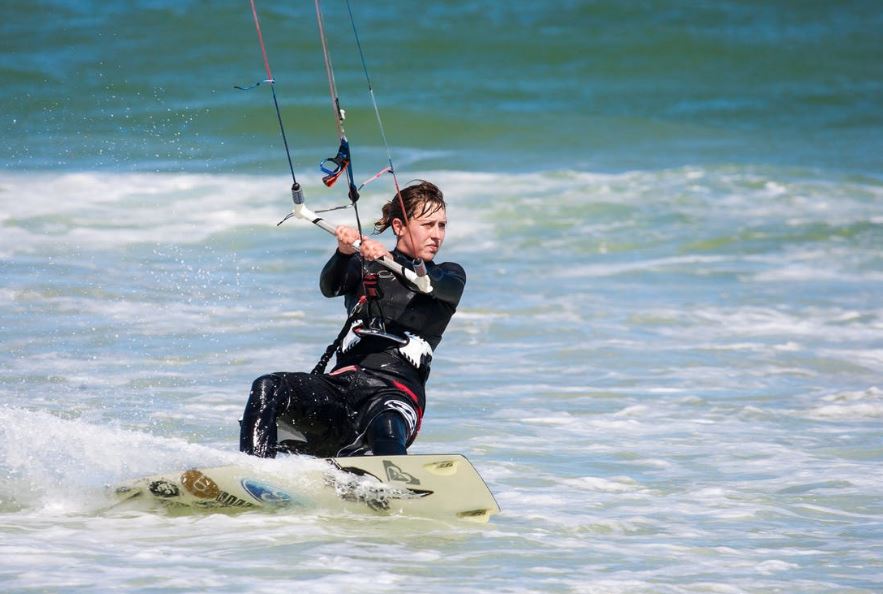 Kite surfing is an enjoyable water sport that yields some health benefits