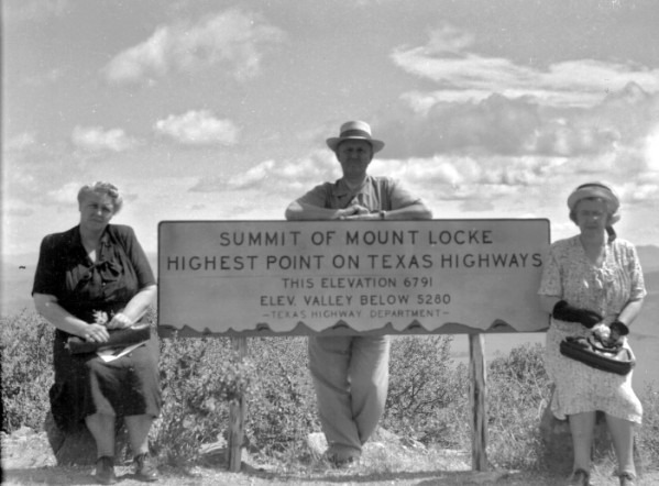 a sign by the Texas Highway Department designating the spot as the Highest Point on Texas Highways