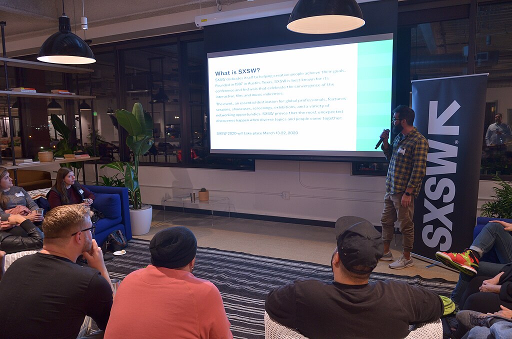 SXSW employee giving an introduction of the event