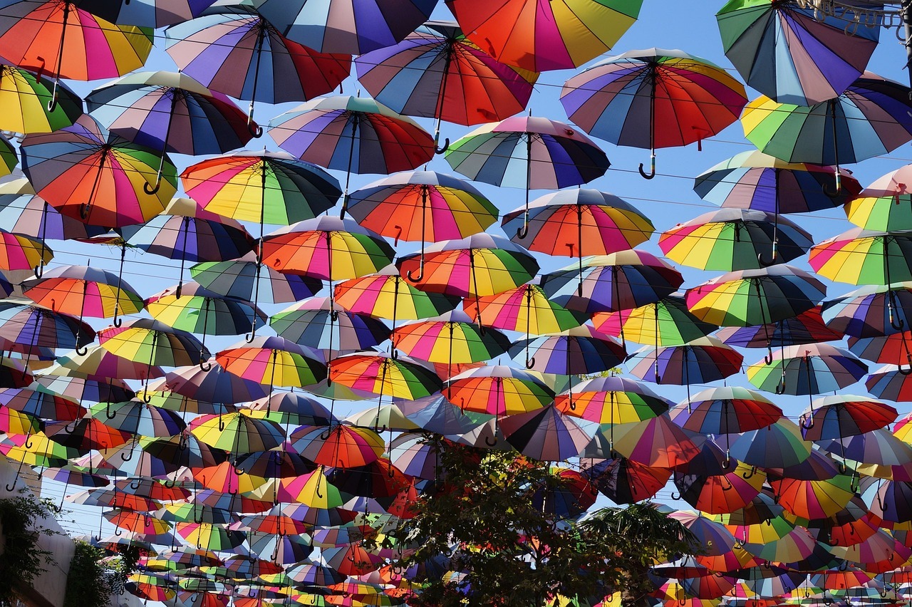 Street shadowed with umbrellas