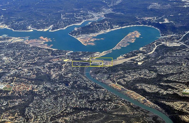 Aerial view of part of Lake Travis and the Colorado River west of Austin, Texas, looking northeast, centered on the Mansfield Dam, which created Lake Travis