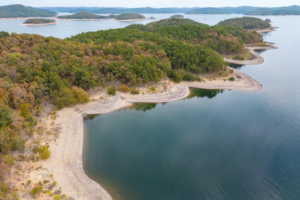 Aerial view of the landscape of the surface of the water of Broken Bow Lake