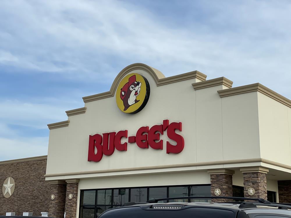 Bucees logo on a storefront in Madisonville, Texas