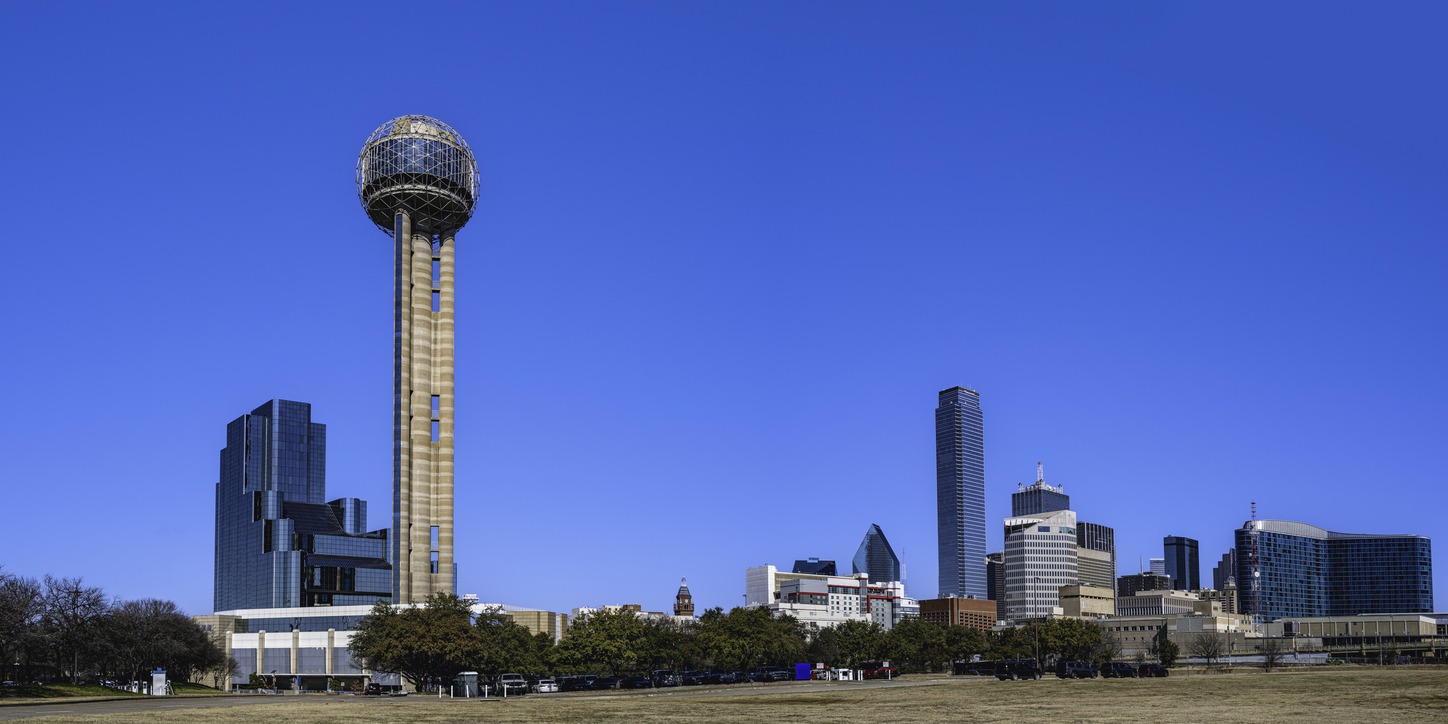 Tranquil and beautiful Dallas City downtown buildings and skyline, panorama with Reunion Tower over the Trinity Skyline Trail Park meadow in Texas, USA