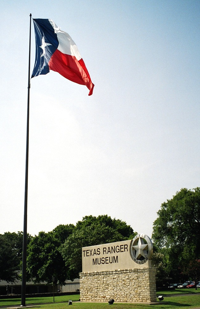 Texas flag and entrance sign