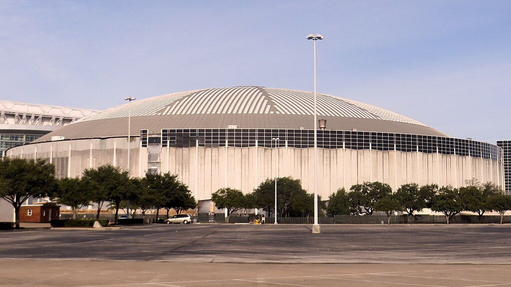 the Reliant Astrodome in Houston from a parking lot near Reliant Arena