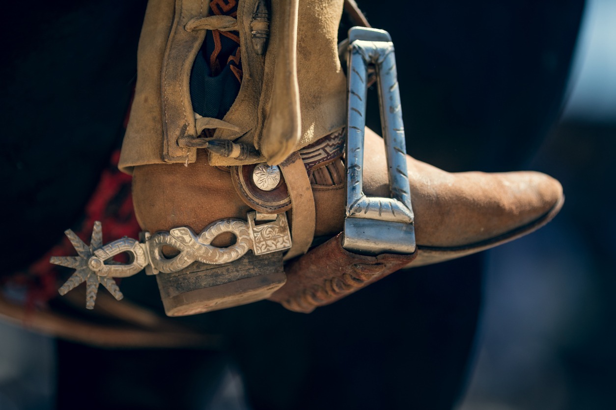 Charro Cowboy boot with spur in stirrup