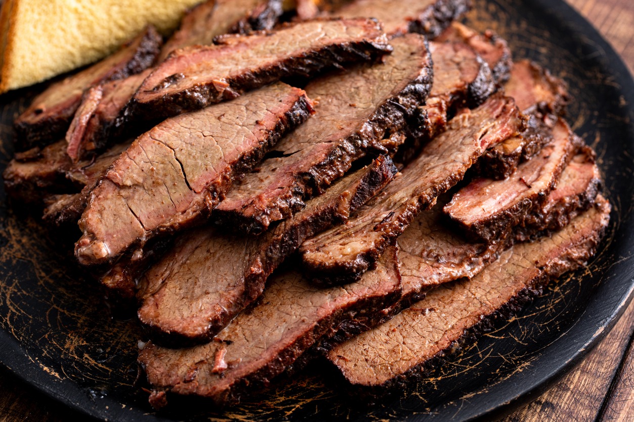 a plate of smoked beef brisket
