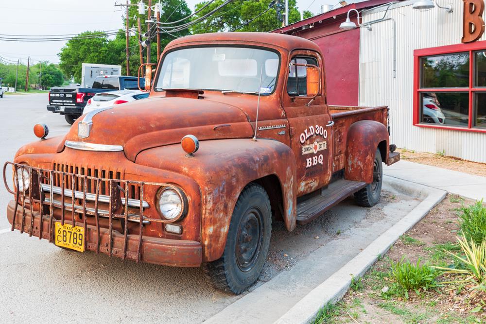 A rusty vintage pickup truck in Texas
