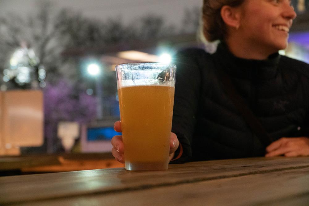 Girl with a glass of beer in Austin, Texas