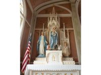 Ornate altar with hand painted Virgin Mary and Jesus Statues in Saint John the Baptist Czech German Catholic Church in Ammannsville, Texas